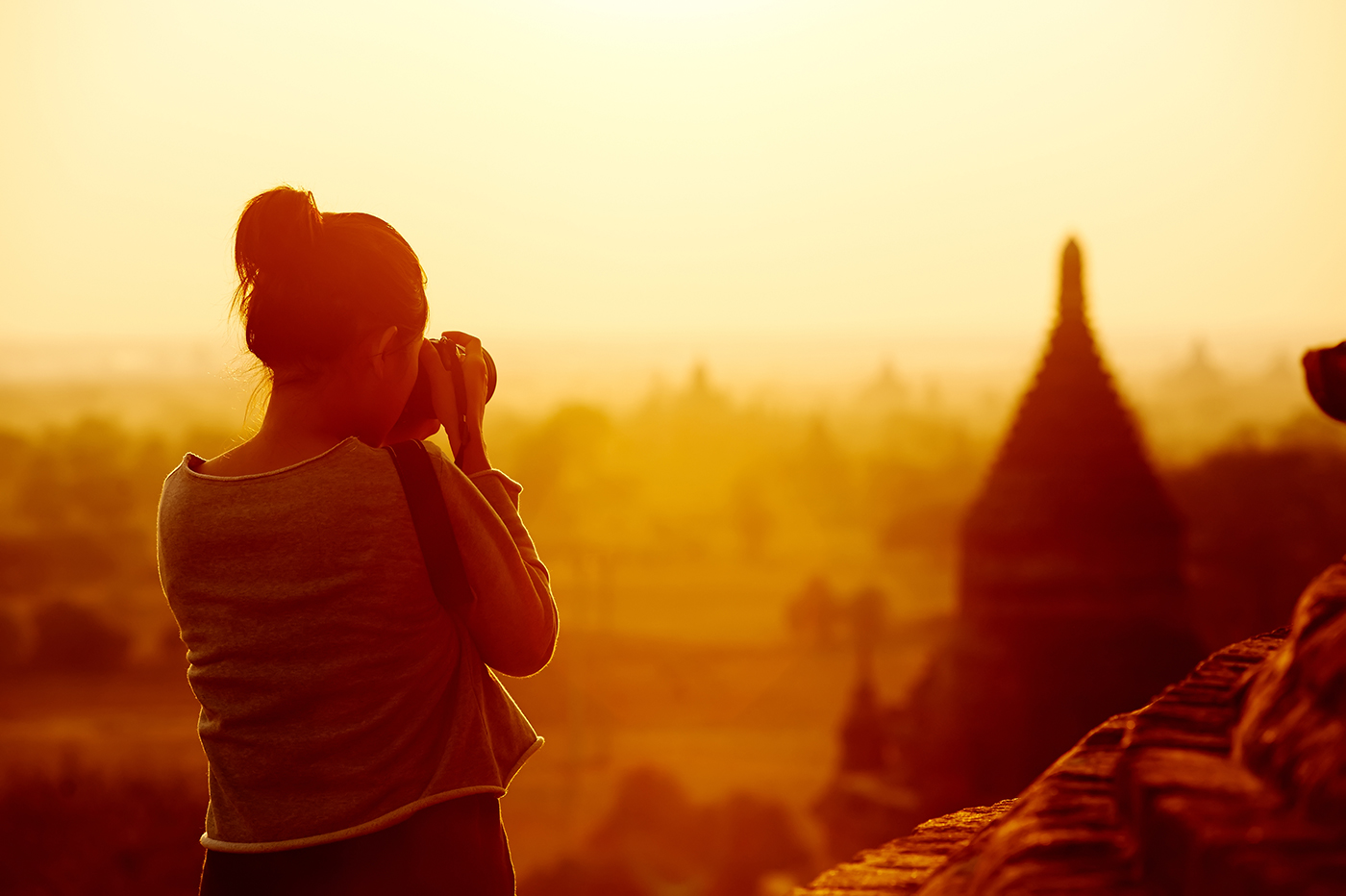 Traveler taking photo of landmark